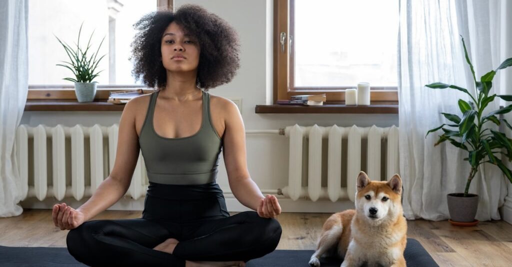 a woman practices yoga at home with her shiba inu dog embracing a relaxing morning